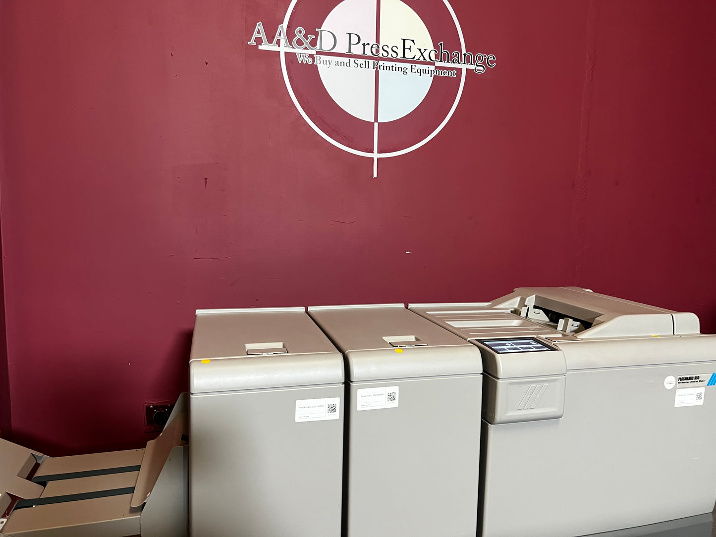 Used Plockmatic 350 200k meter booklet maker angled view showing saddle-stitch and fold modules – AA&D PressExchange
