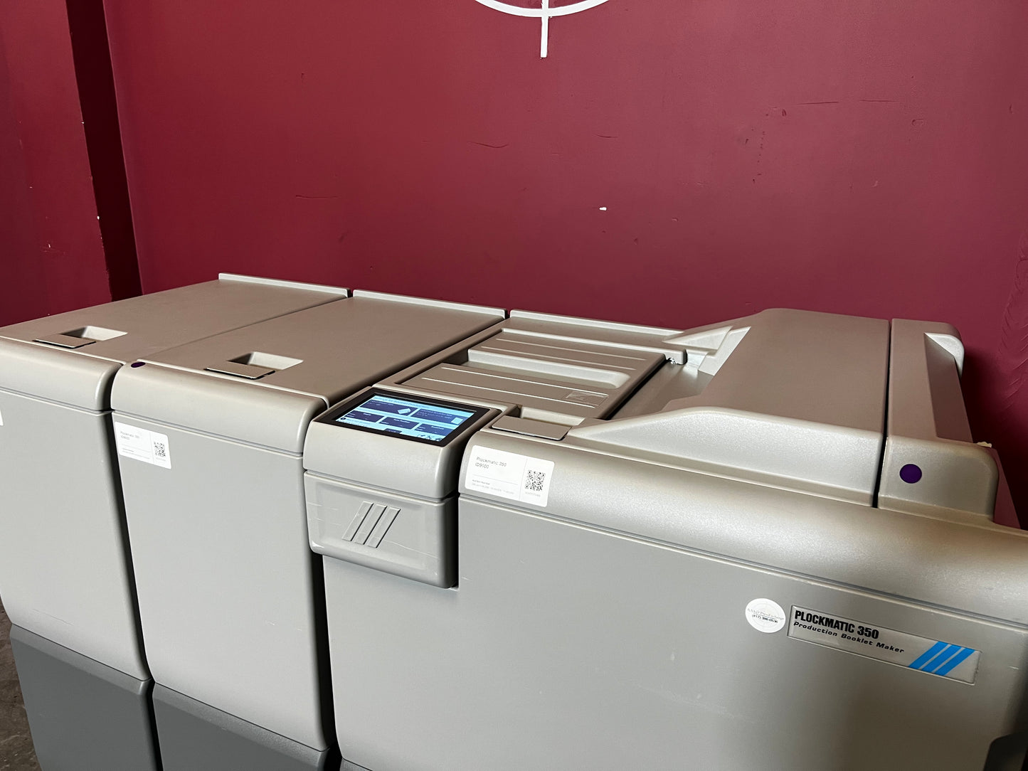 Used Plockmatic 350 90k booklet maker front view in digital print setup – AA&D PressExchange