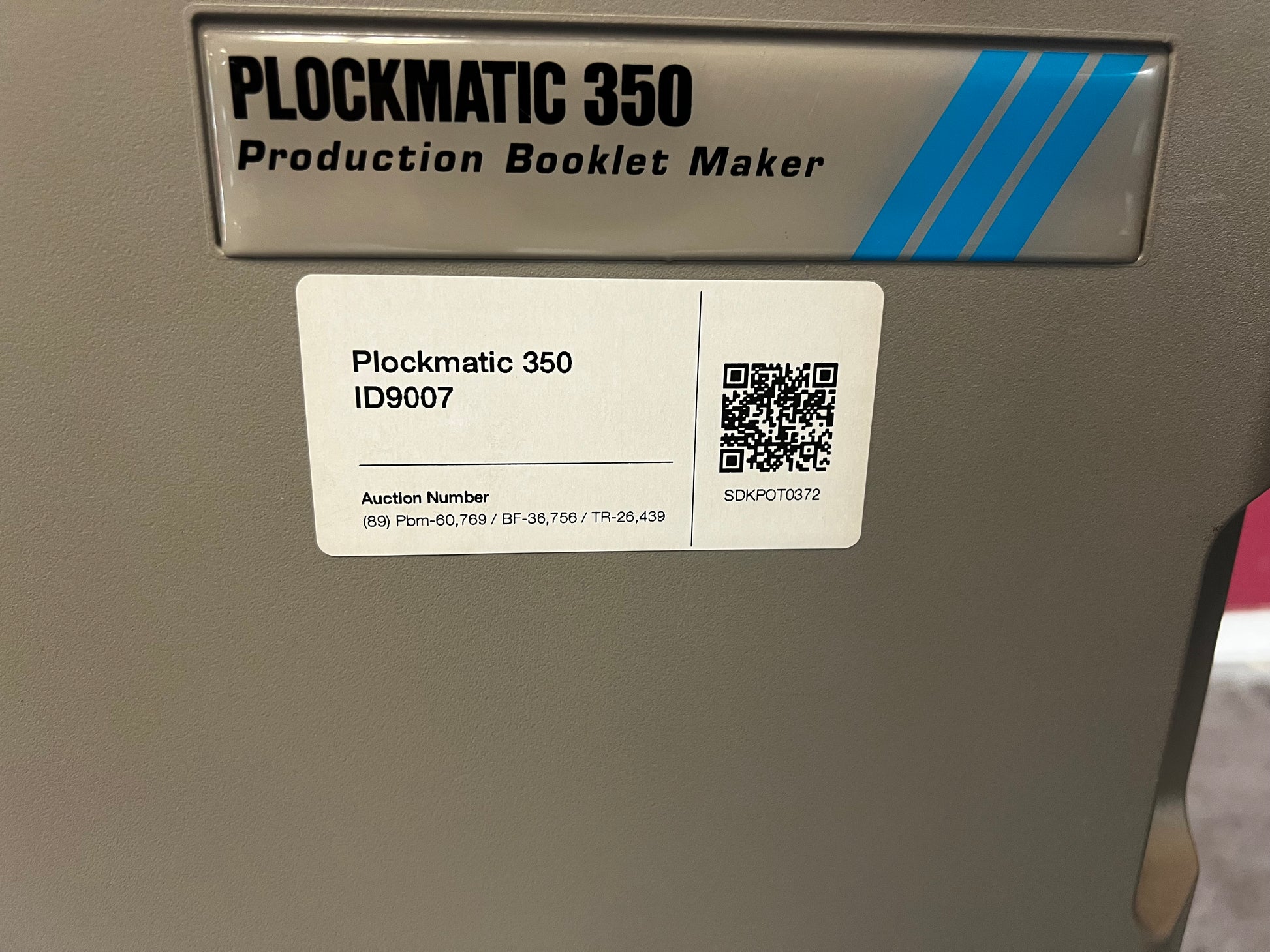 Used Plockmatic 350 booklet maker 60k meter angled view showing saddle-stitch and folding functions – AA&D PressExchange