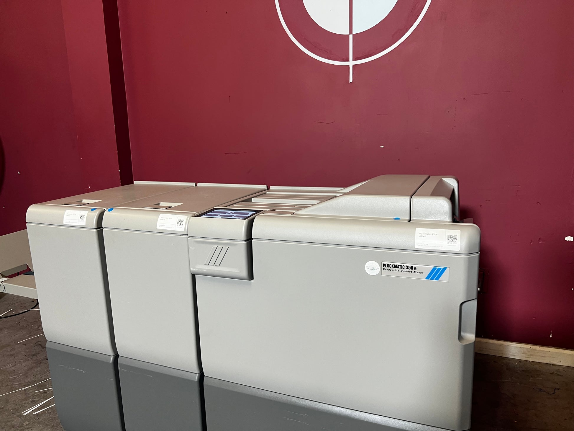 Used Plockmatic 350e booklet maker 120k meter side view highlighting trim and square-back unit – AA&D PressExchange