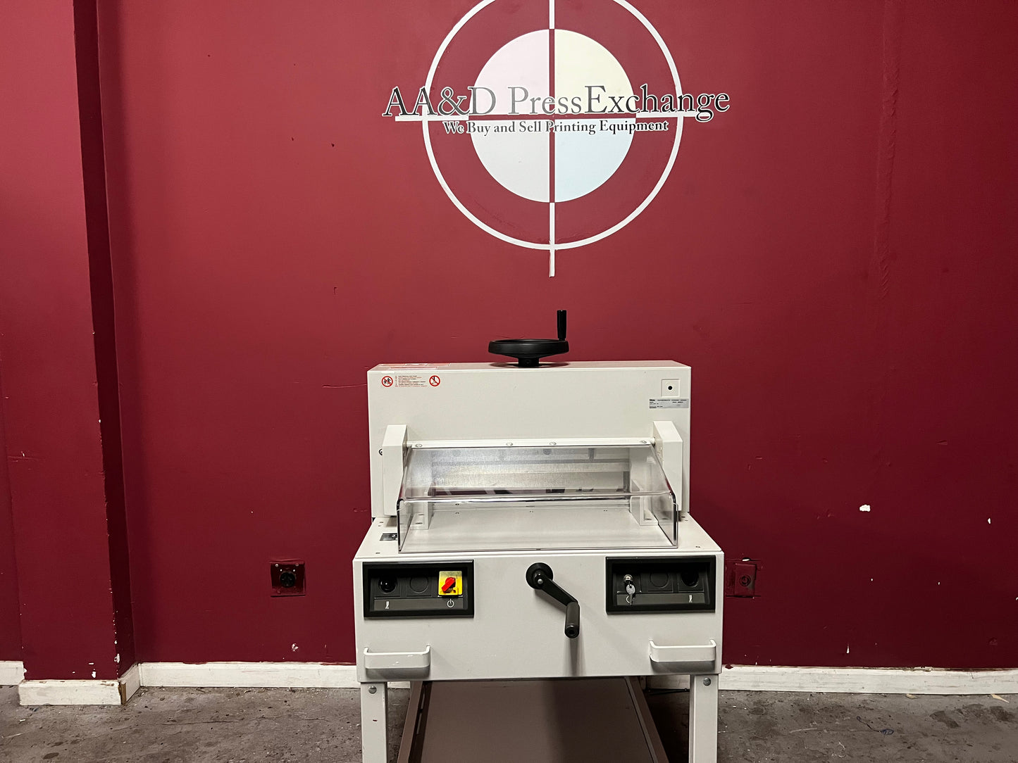 Used Triumph 4810-95 paper cutter rear angle in production environment – AA&D PressExchange