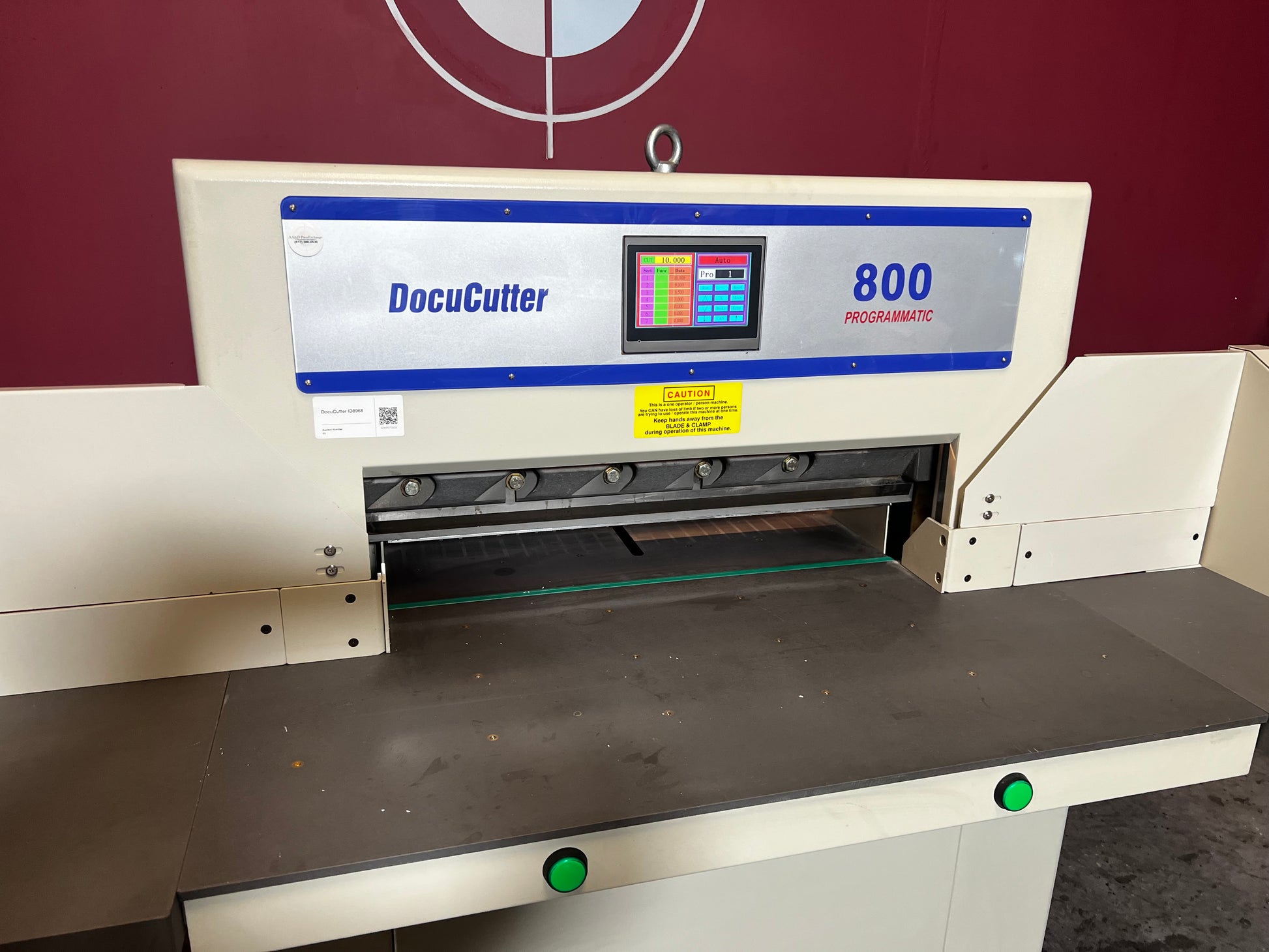 Used Duplo Docucutter 800 Programmatic hydraulic paper cutter close-up of clamp and blade – AA&D PressExchange