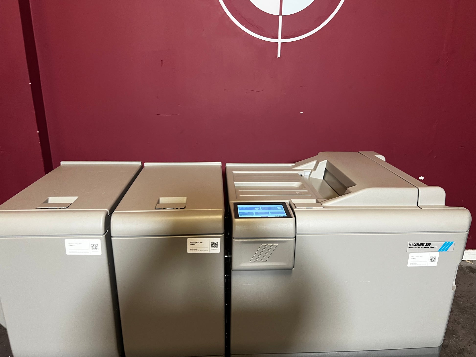 Used Plockmatic 350 booklet maker 60k meter close-up of square back and trim unit – AA&D PressExchange
