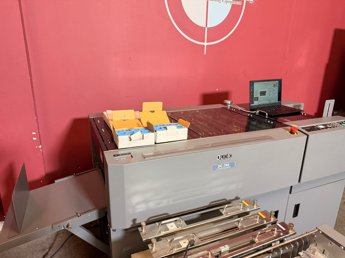 Used Duplo DC-746 Slitter Cutter Creaser side panel showing industrial build quality