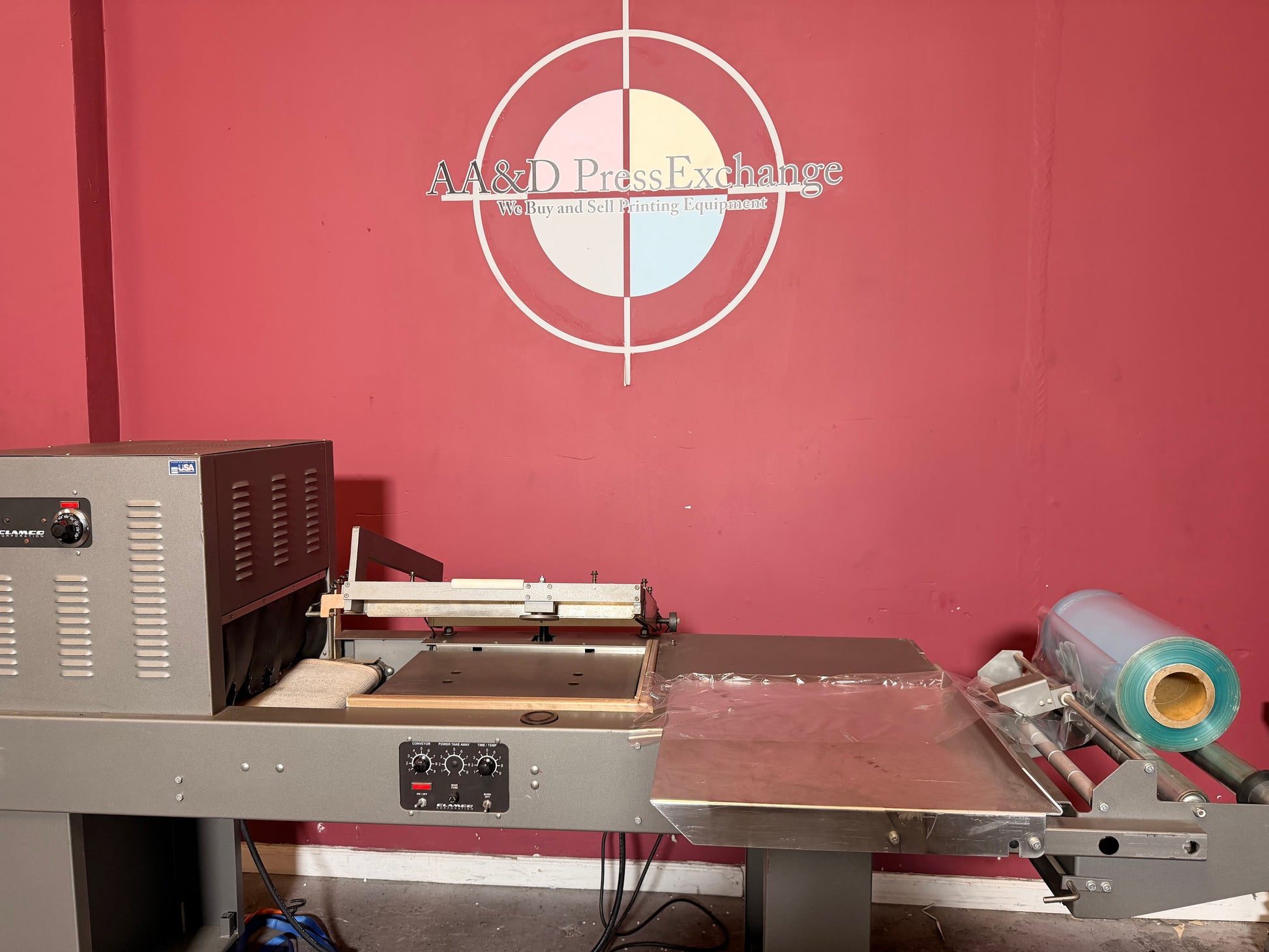 Used Clamco shrink wrap combo system conveyorized heat tunnel packaging equipment