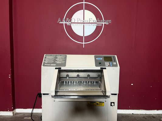 Used Challenge Titan 200 Hydraulic Paper Cutter at AA&D PressExchange, front view with safety features.