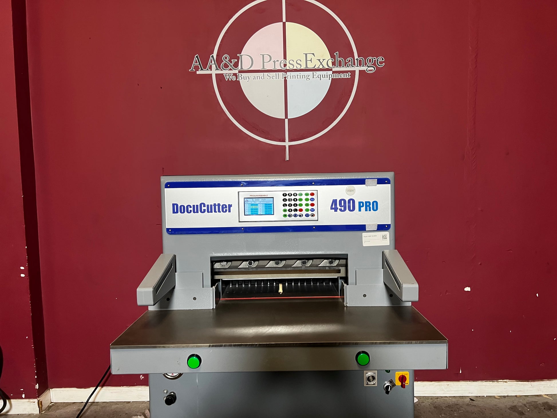 AA&D PressExchange Used Duplo 490 PRO hydraulic paper cutter side view highlighting hydraulic system