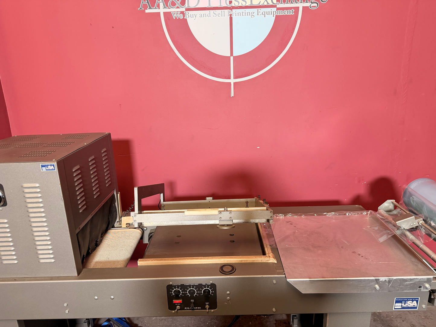 Used Clamco heat shrink tunnel and L bar sealer close up
