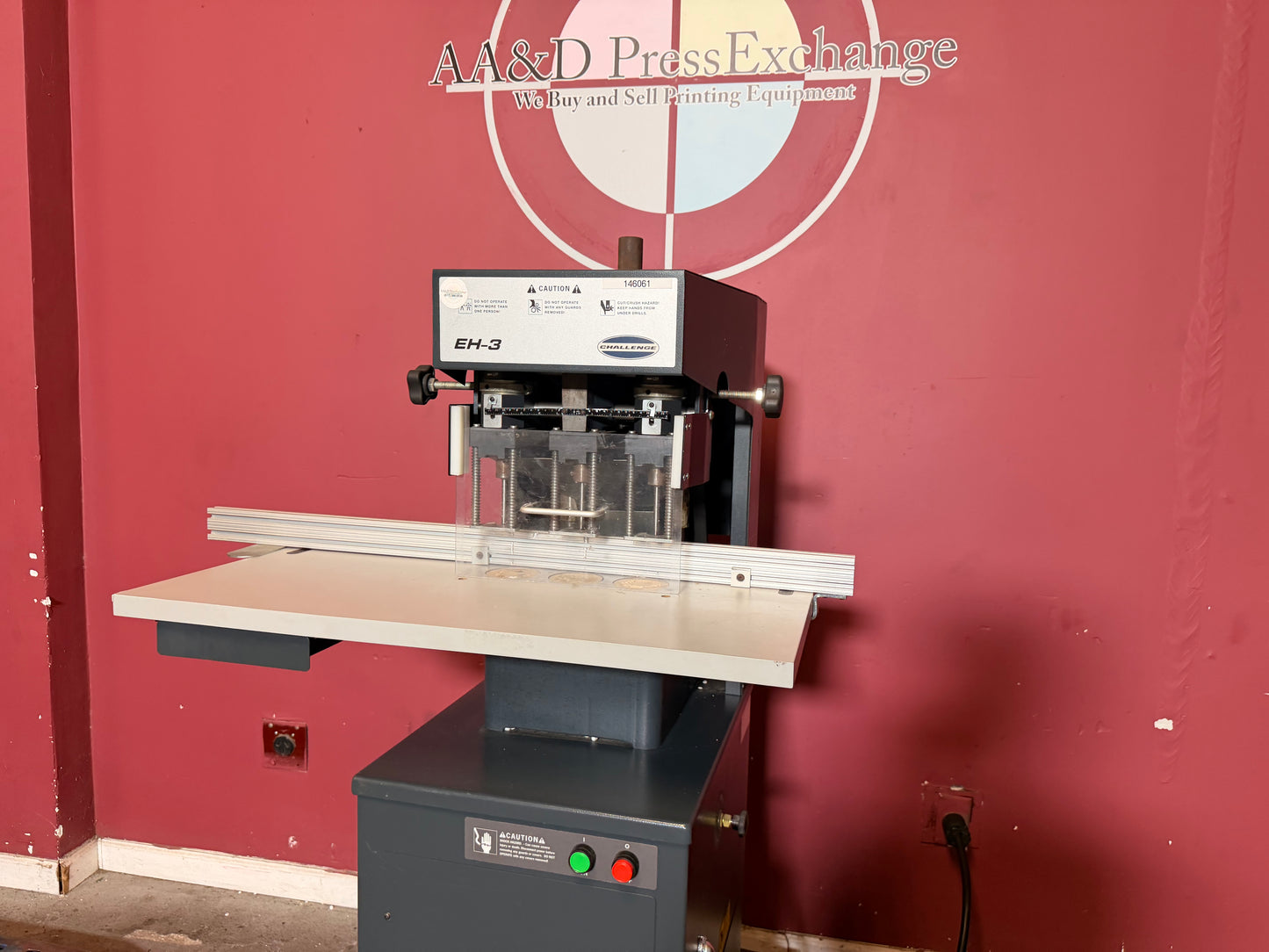 Used Challenge EH-3 Paper Drill side view showing triple drill head configuration