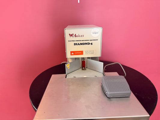 Used Akiles Diamond-5 corner rounder manual desktop machine front angle view – AA&D PressExchange