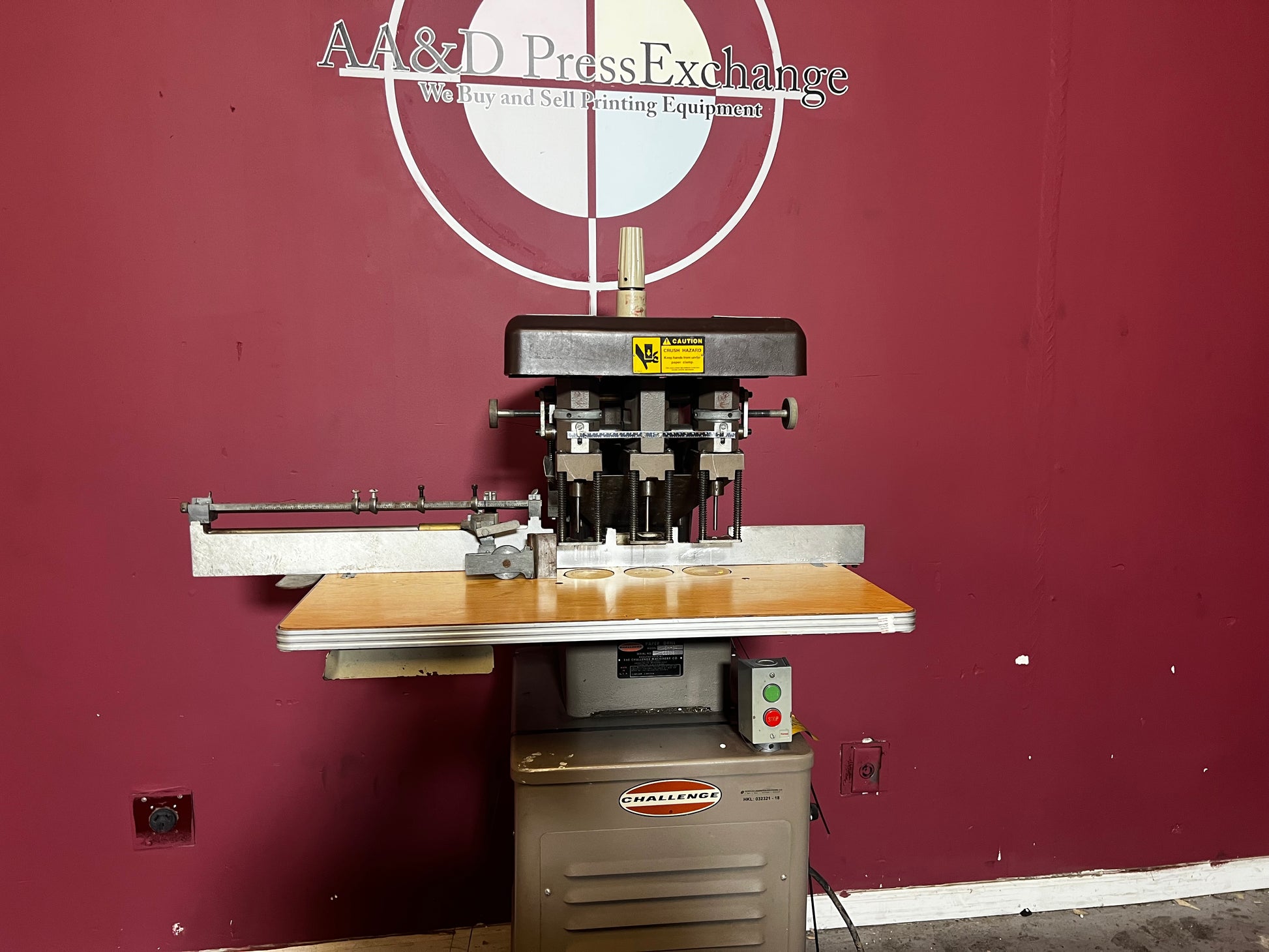 AA&D PressExchange Used Challenge EH-3A Paper Drill with adjustable drilling heads and foot pedal control.