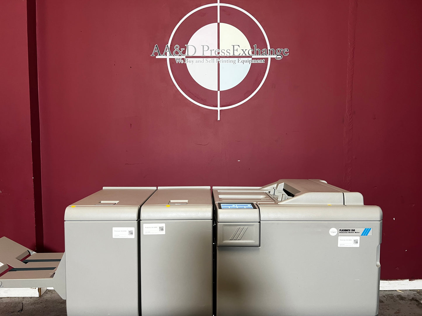 Used Plockmatic 350 200k meter booklet maker top-down view showing folding and trim sections – AA&D PressExchange