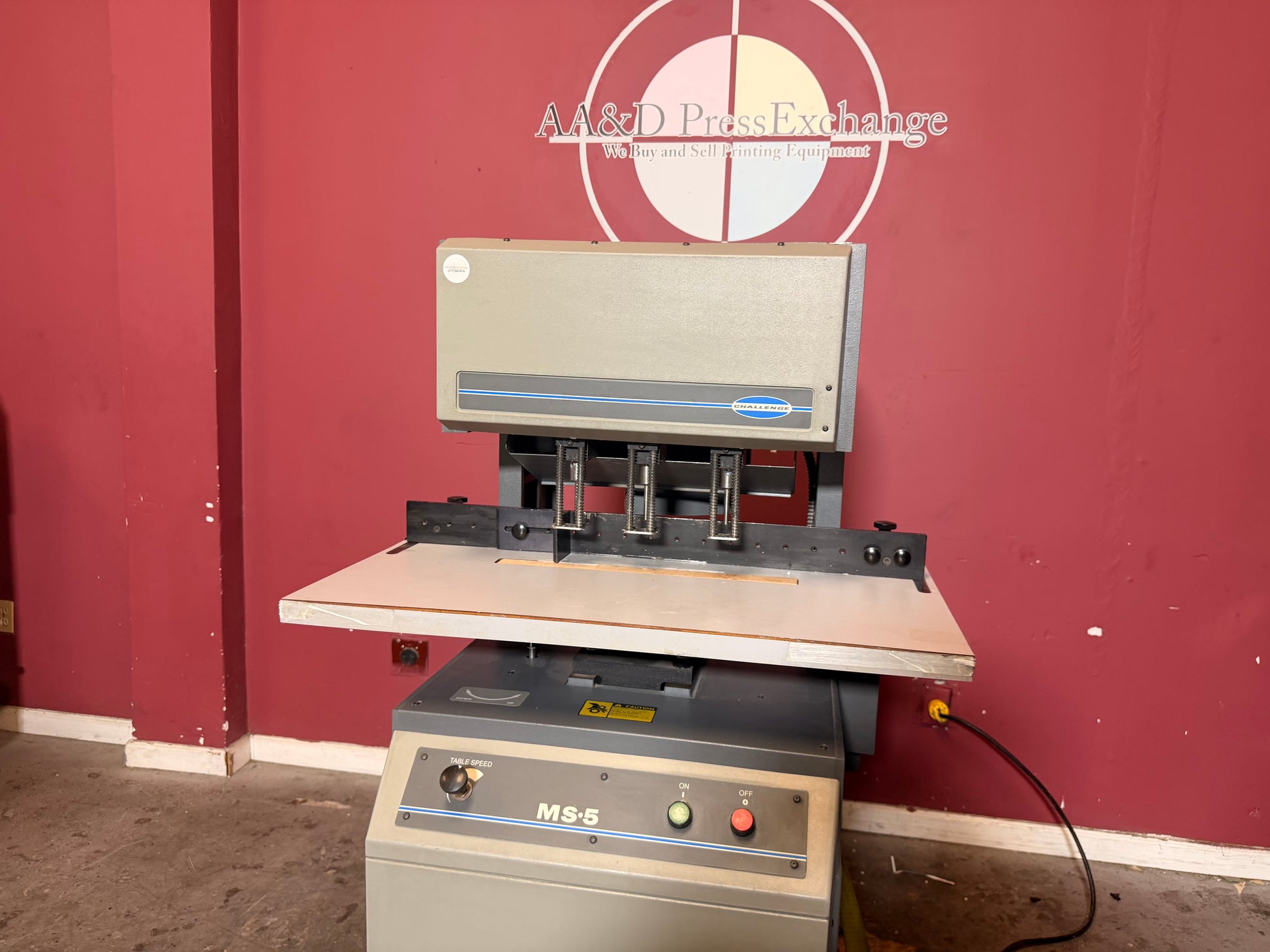 Used Challenge MS-5 paper drill for sale front view with three adjustable drilling heads