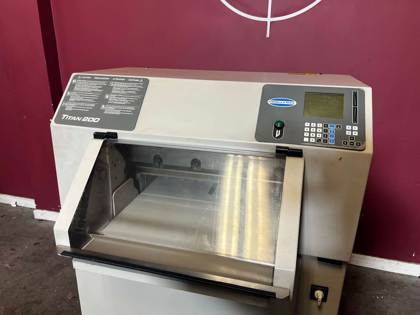 AA&D PressExchange used Challenge Titan 200 Hydraulic Paper Cutter with programmable back gauge.