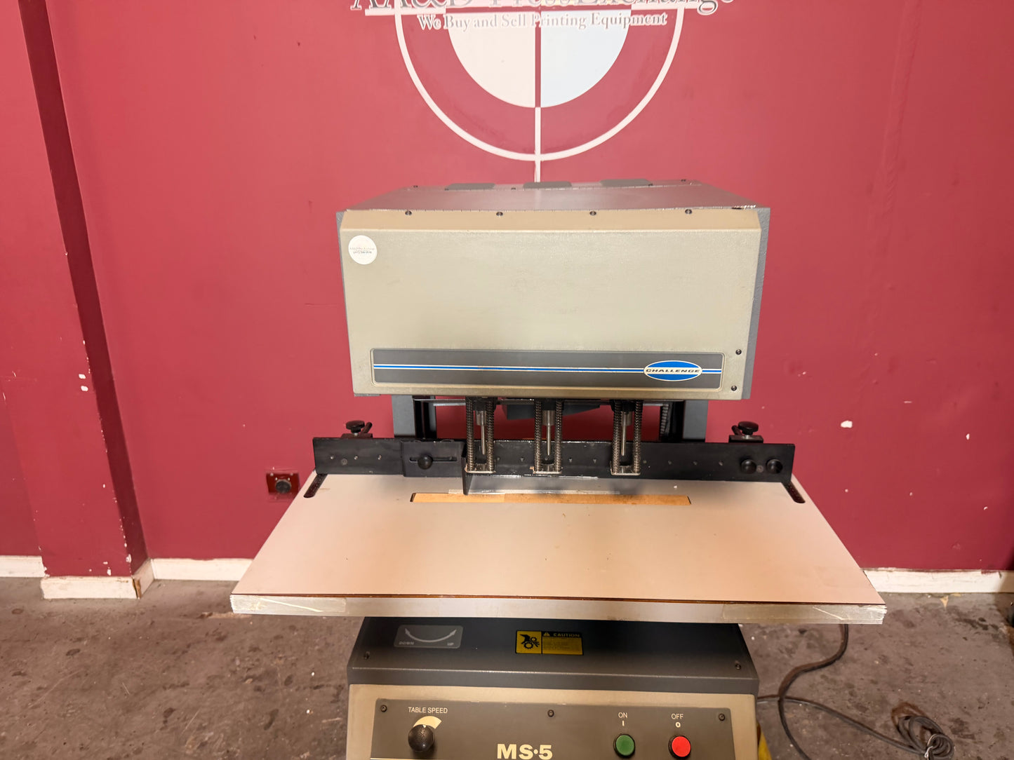 Used Challenge MS-5 multi spindle paper drill for sale with 2.5 inch drilling capacity