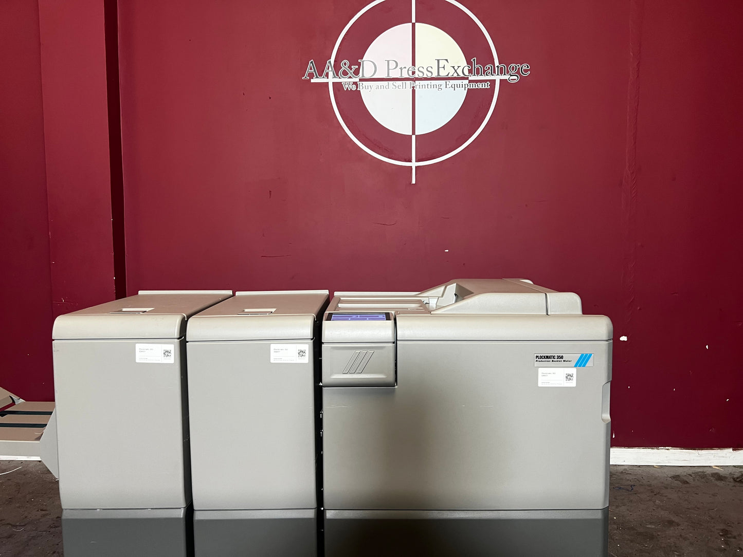 Used Plockmatic 350 booklet maker 60k meter close-up of stitching and folding module – AA&D PressExchange
