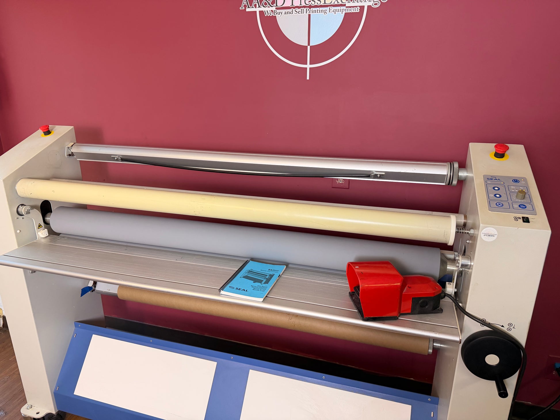 Used Seal 54 heat assist laminator close-up of rollers – AA&D PressExchange