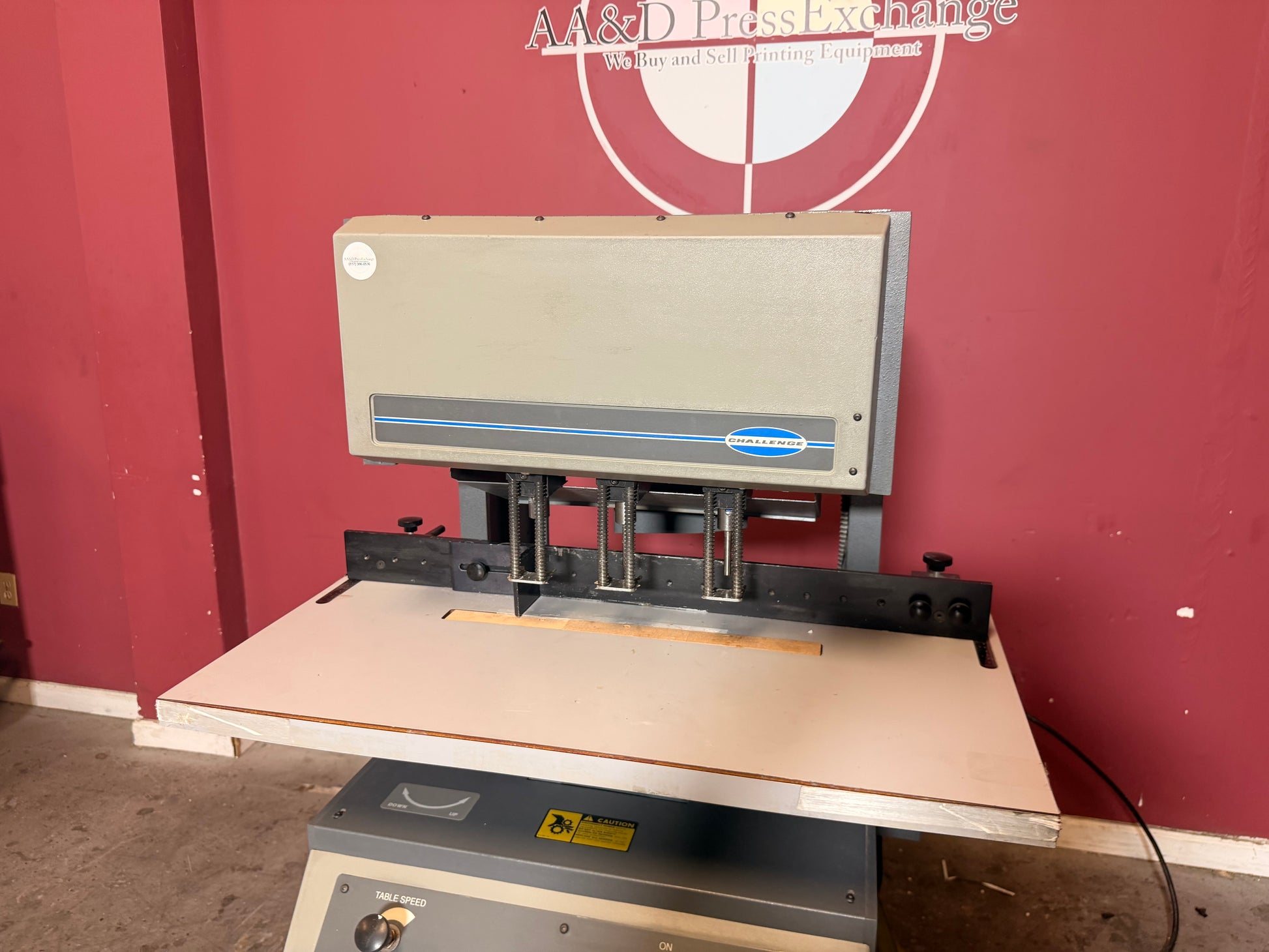 Used Challenge MS-5 multi hole paper drill for sale with hydraulic table lift system