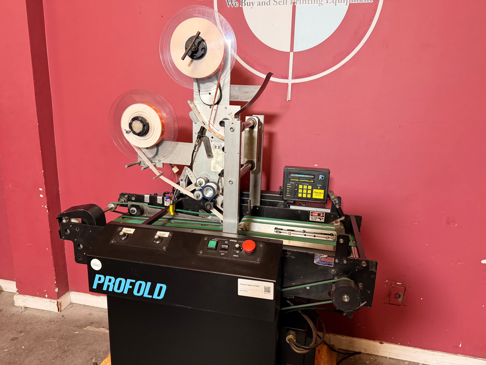 Used Profold tabbing machine spool holder and web threading unit reducing downtime