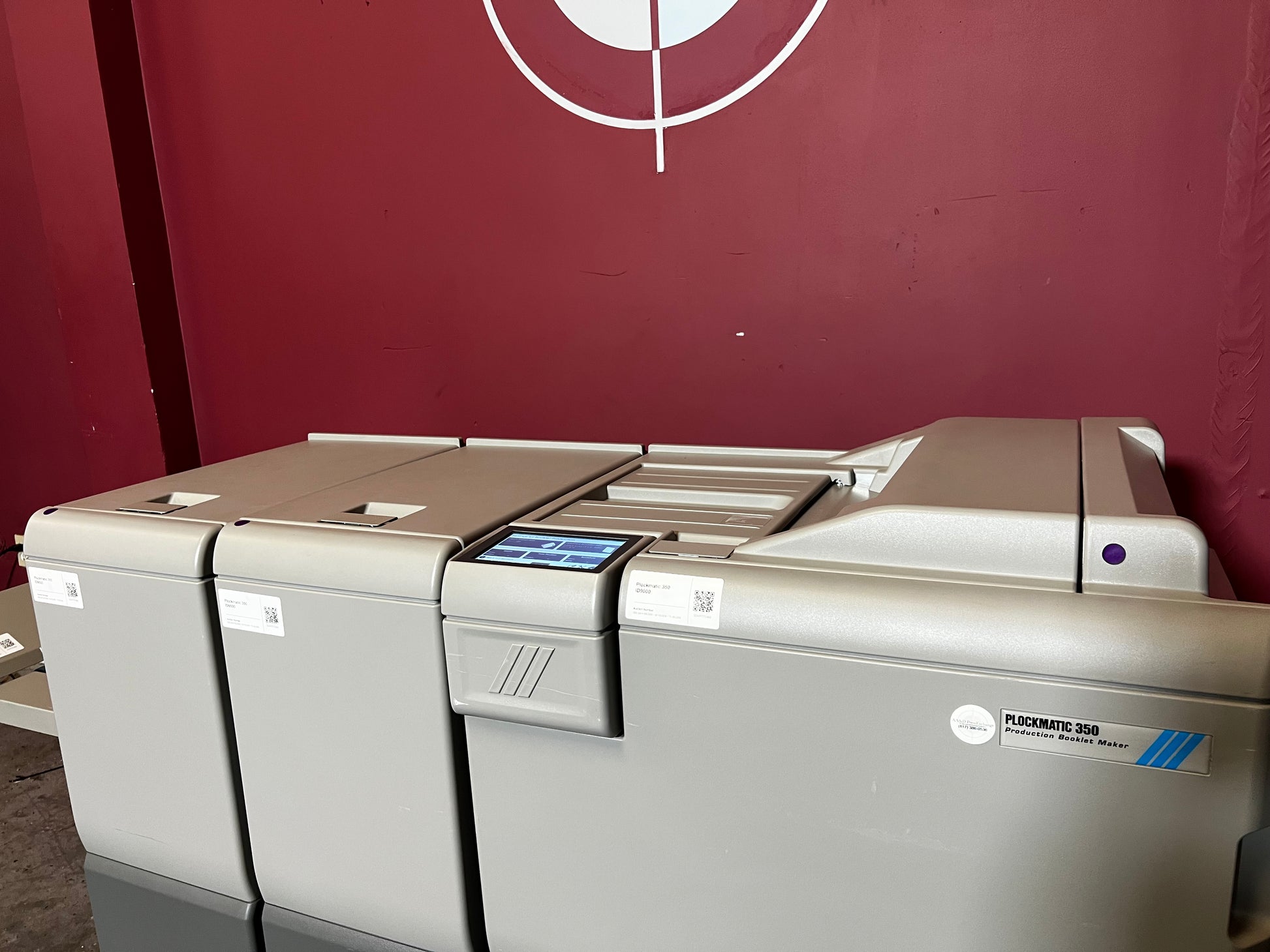 Used Plockmatic 350 90k booklet maker front/angled view highlighting trimming unit – AA&D PressExchange