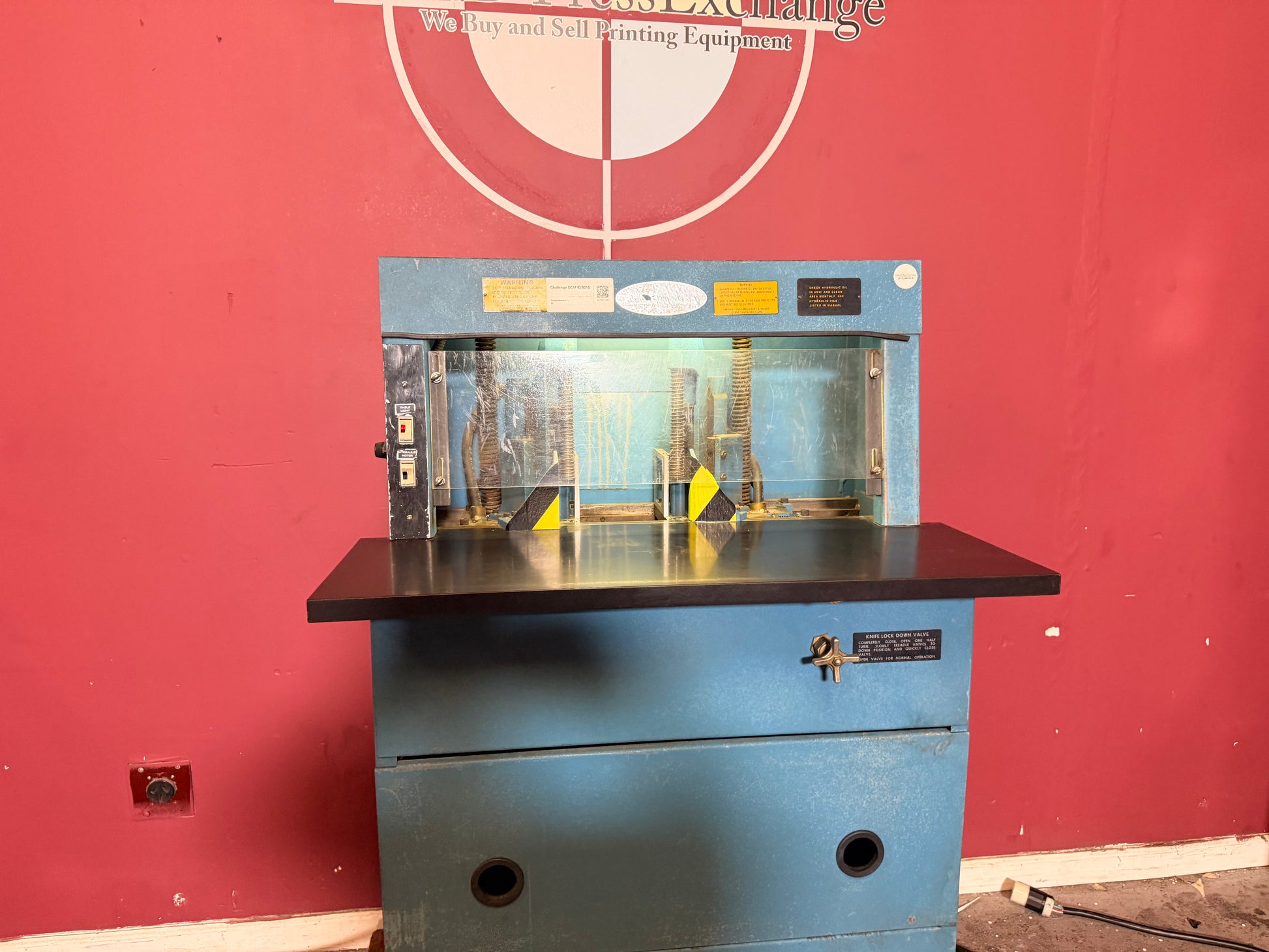 Used Challenge DCM Double Round Cornering Machine cutting area with 4 inch stack capacity