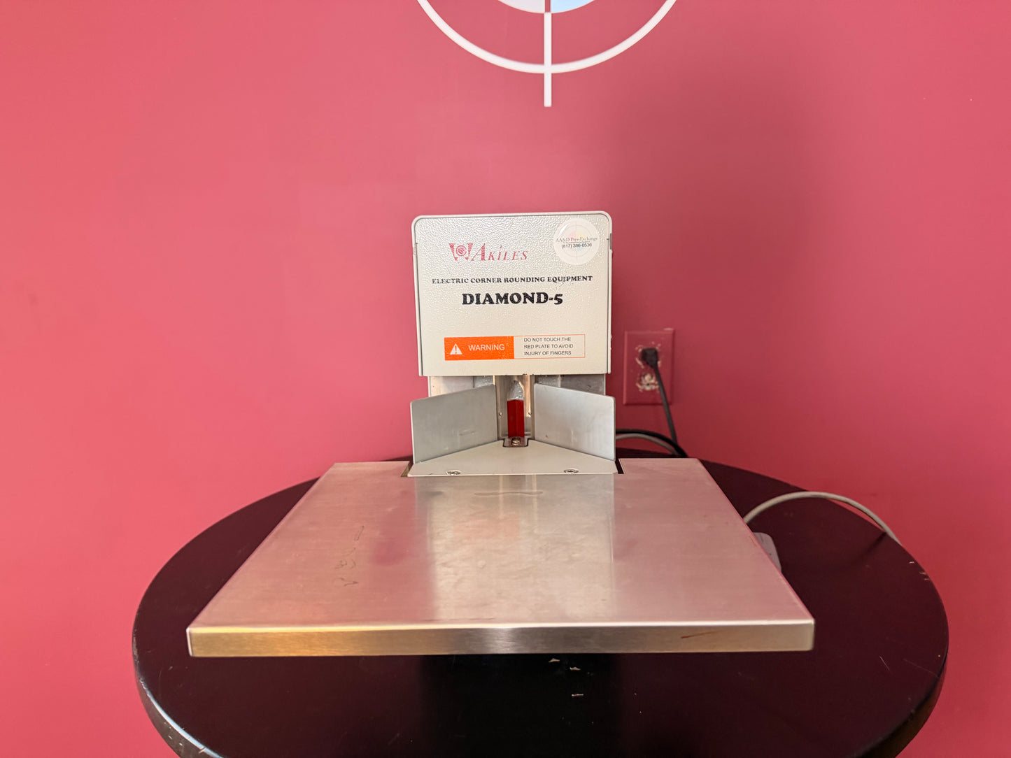 Used Akiles Diamond-5 electric corner rounder close-up of cutting head and die area – AA&D PressExchange