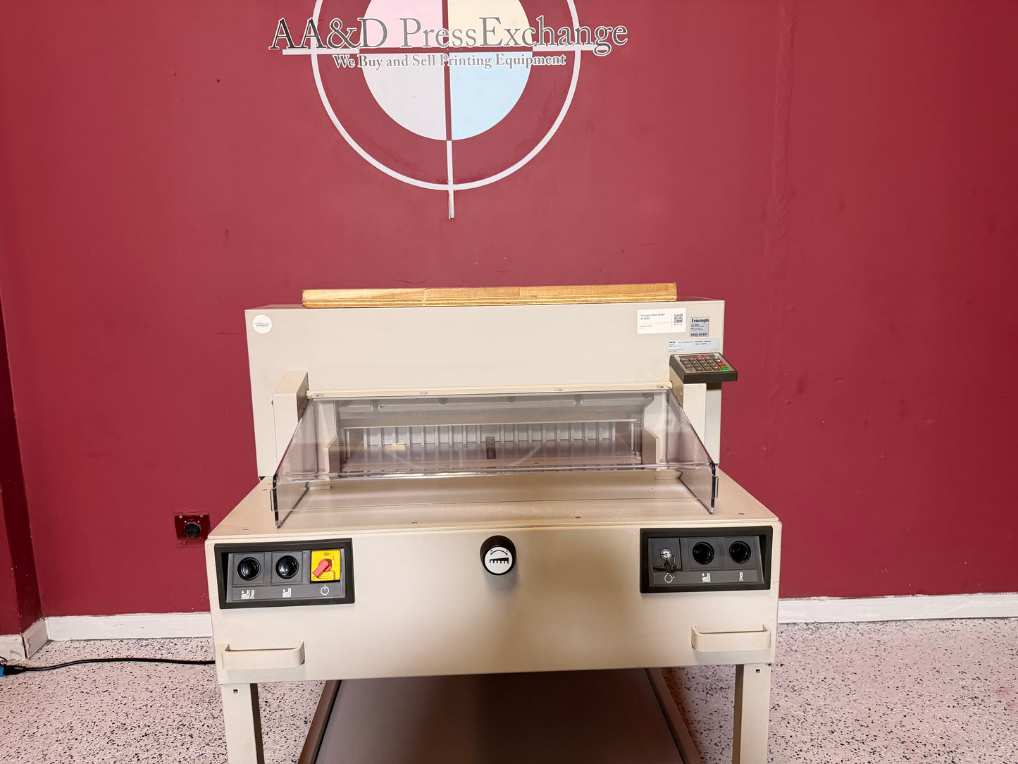 Triumph 6550-95 programmable paper cutter with adjustable clamp pressure
