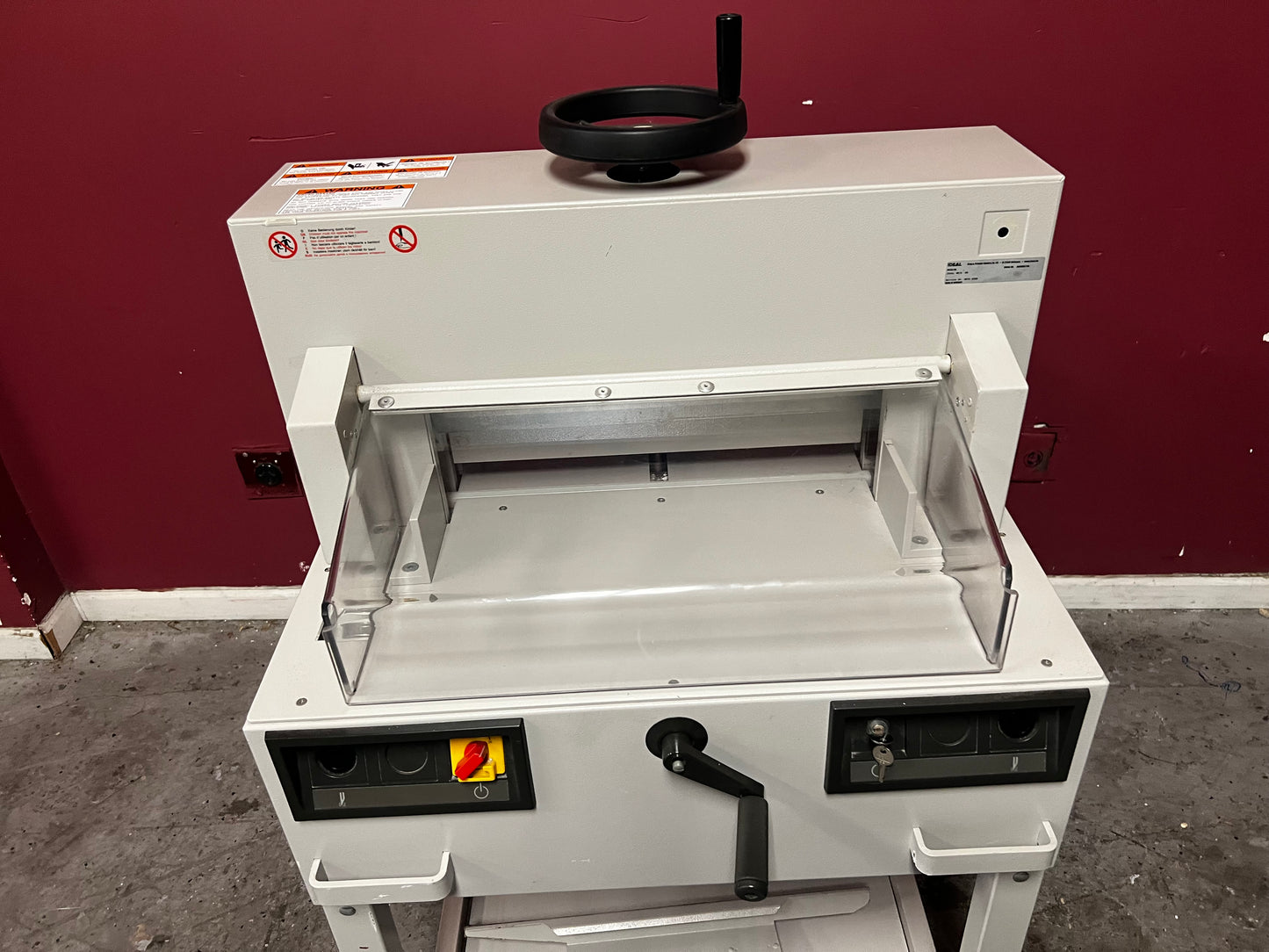 Used Triumph 4810-95 cutter angled view showing manual back gauge controls – AA&D PressExchange