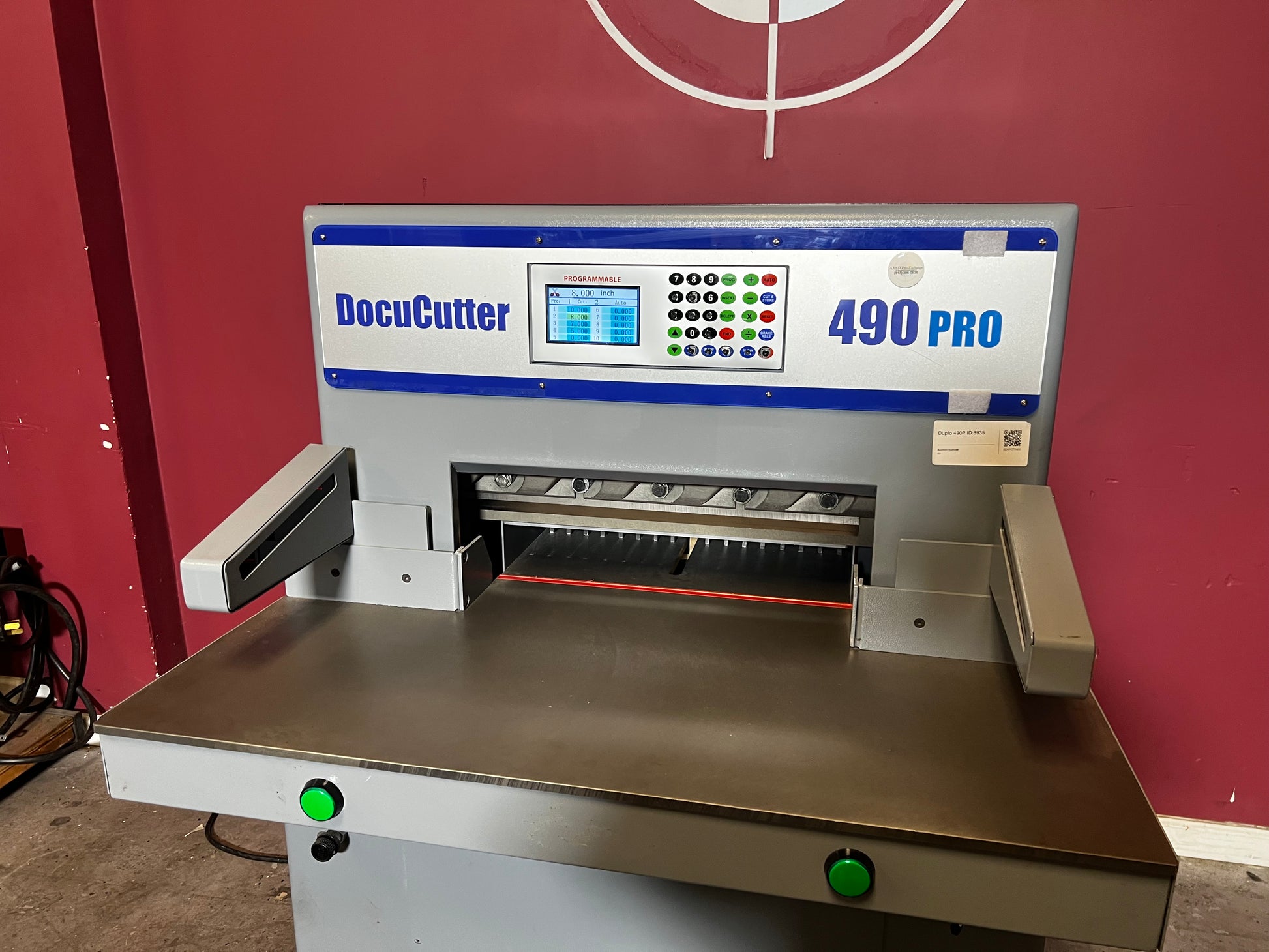 AA&D PressExchange Used Duplo 490 PRO hydraulic paper cutter top view of cutting table and guides