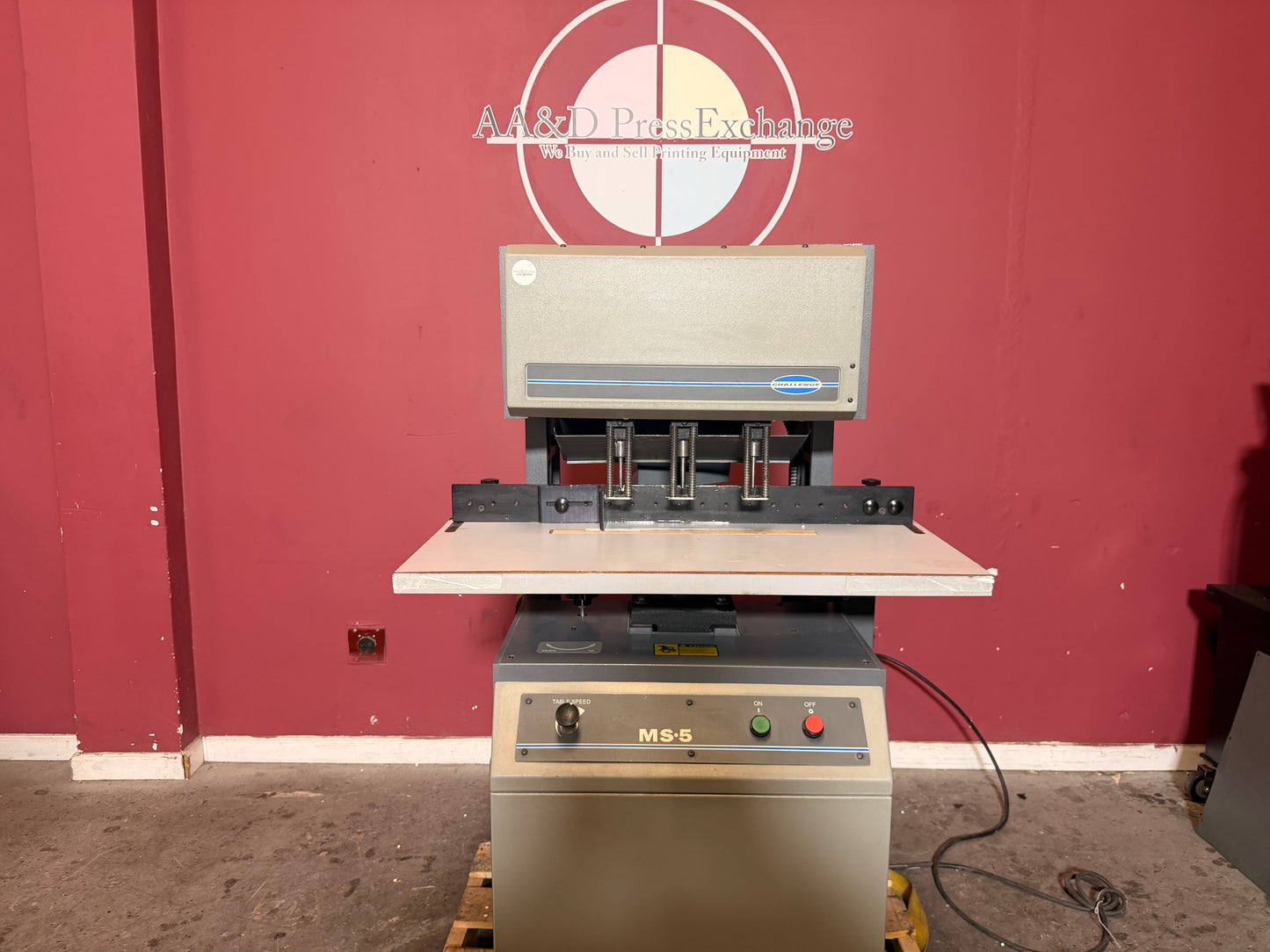 Used Challenge MS-5 paper drill for sale close up of hollow drill bits and spindle heads