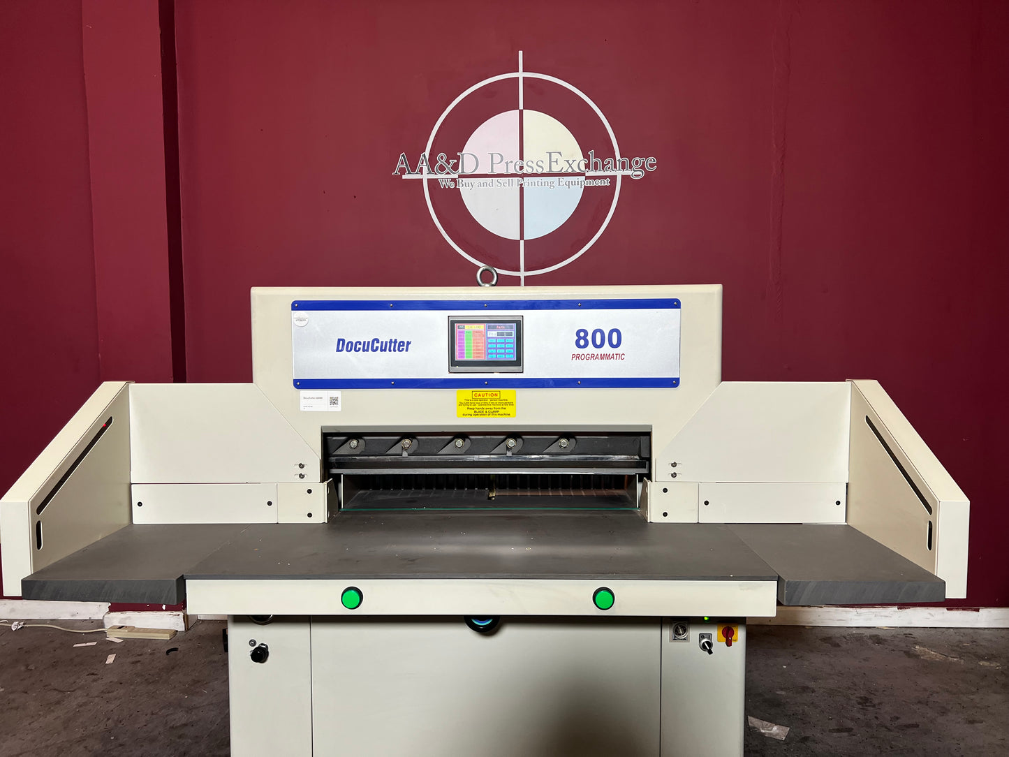 Used Duplo Docucutter 800 Programmatic hydraulic paper cutter showing large format cutting surface – AA&D PressExchange