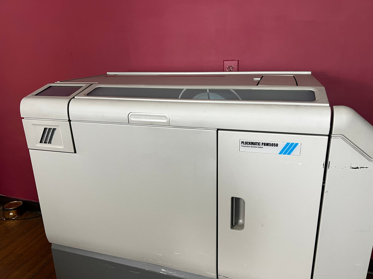 Used Plockmatic 5050 bookletmaker 63k meter front/angled view connected inline with digital press – AA&D PressExchange