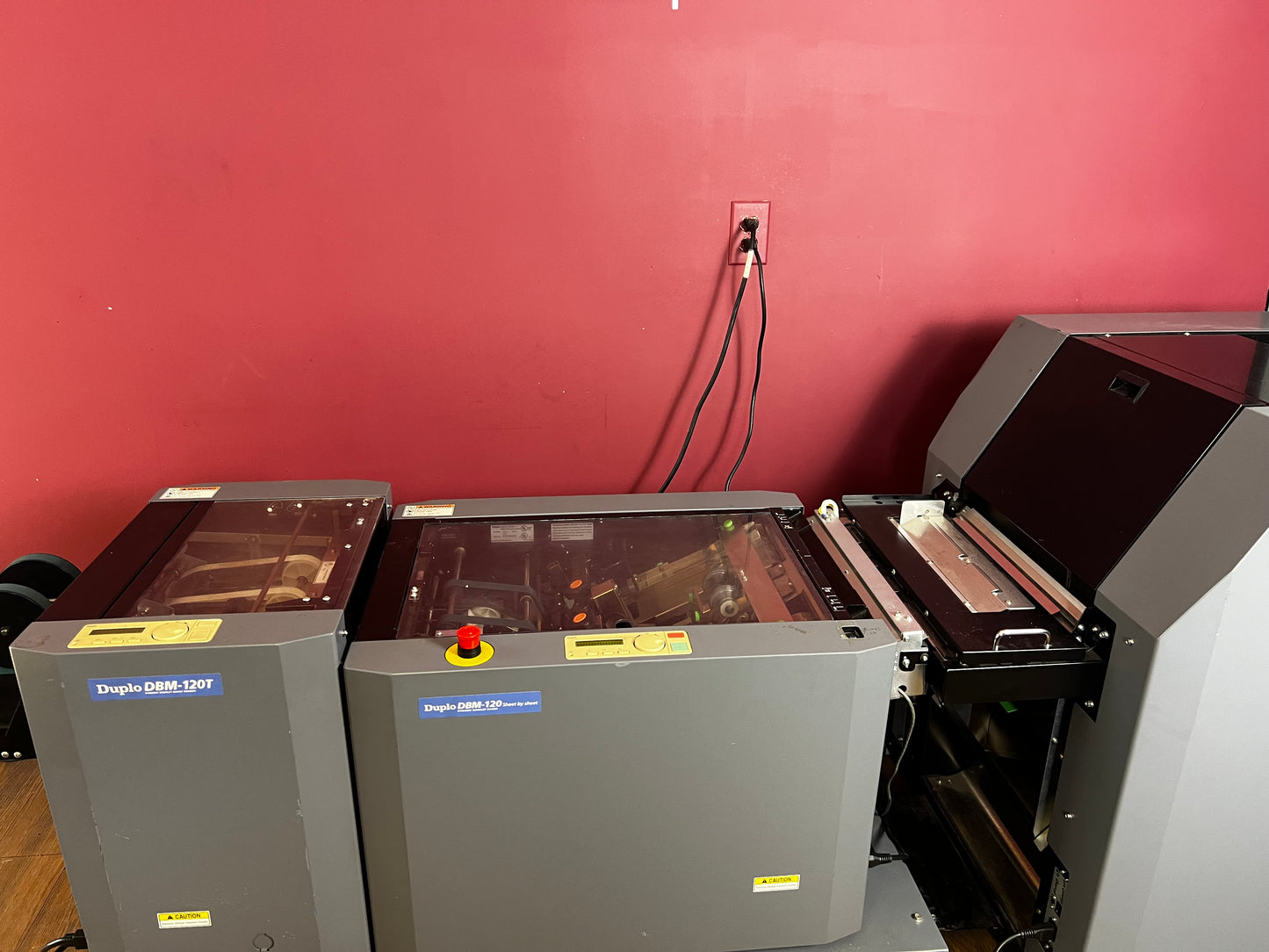 Used Duplo DBM-120 booklet maker with stacked paper – AA&D PressExchange
