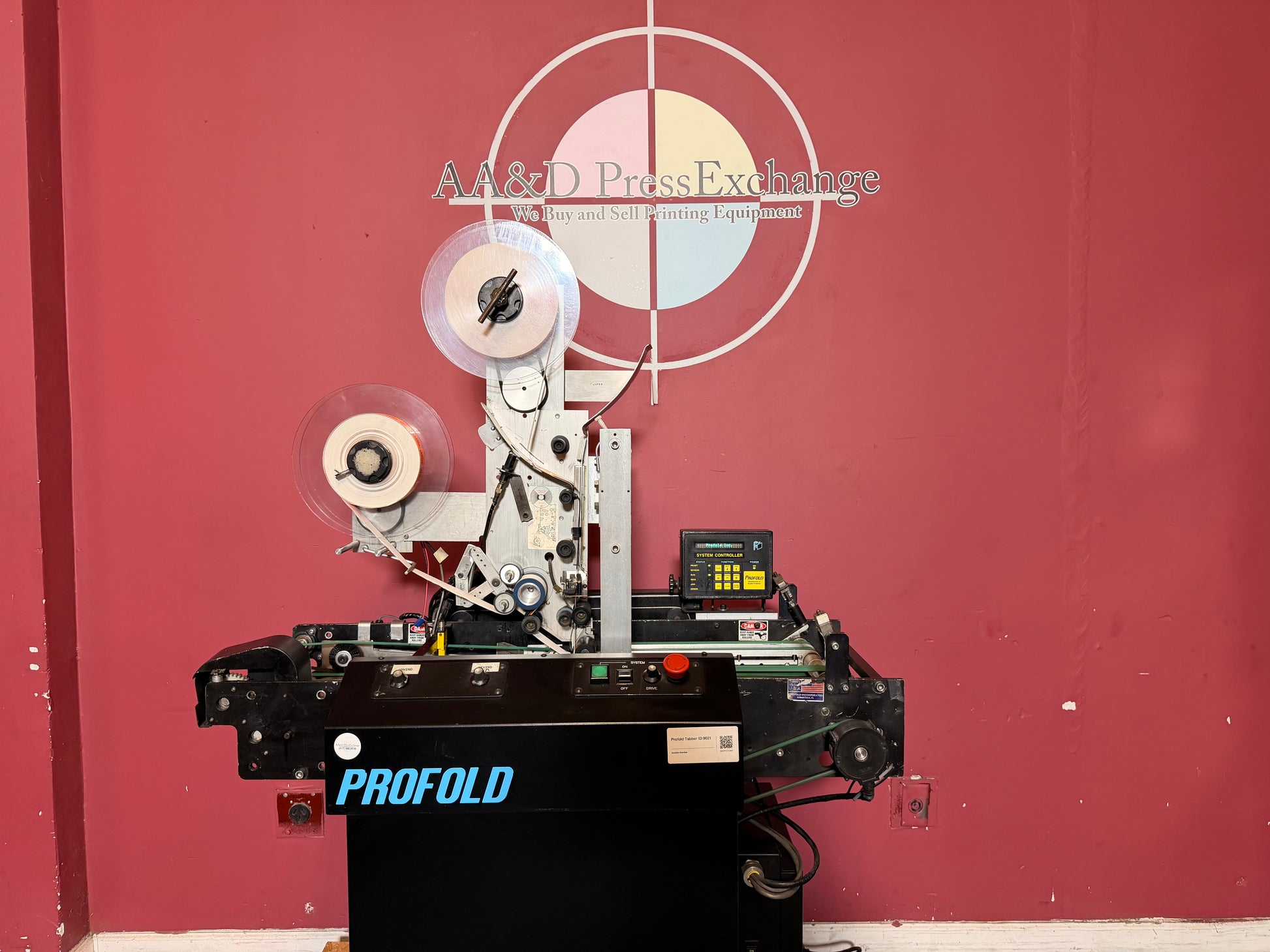 Used Profold tabbing machine high capacity spool and feeder system for long runs