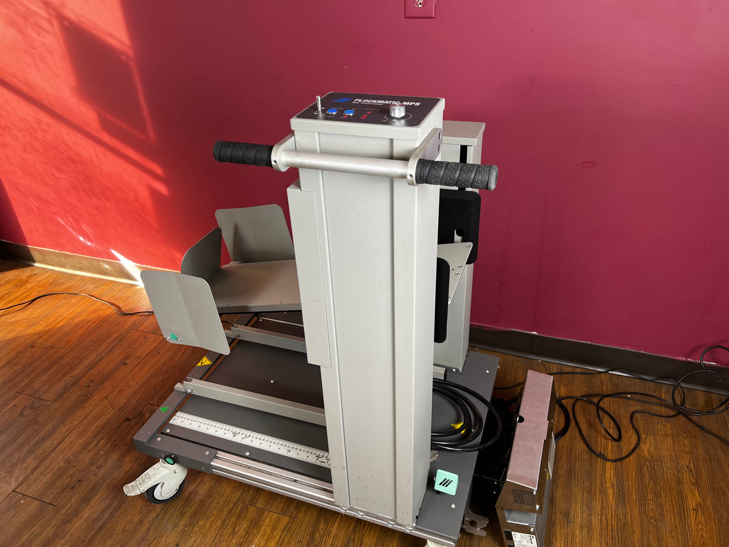 Used Plockmatic MPS Multi-Purpose Stacker angled side view in production environment – AA&D PressExchange