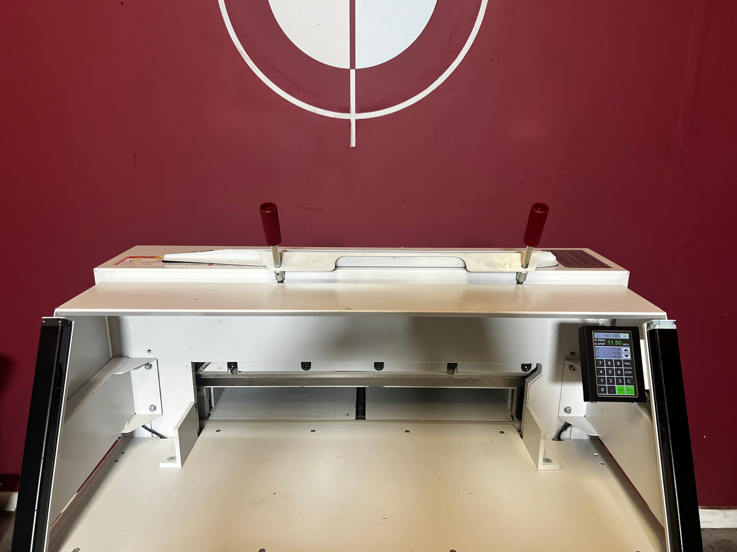 Used Triumph 6660 paper cutter rear/angled view showing programmable interface – AA&D PressExchange