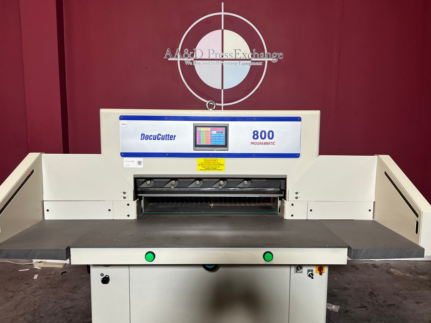 Used Duplo Docucutter 800 Programmatic rear view highlighting hydraulic clamp system – AA&D PressExchange