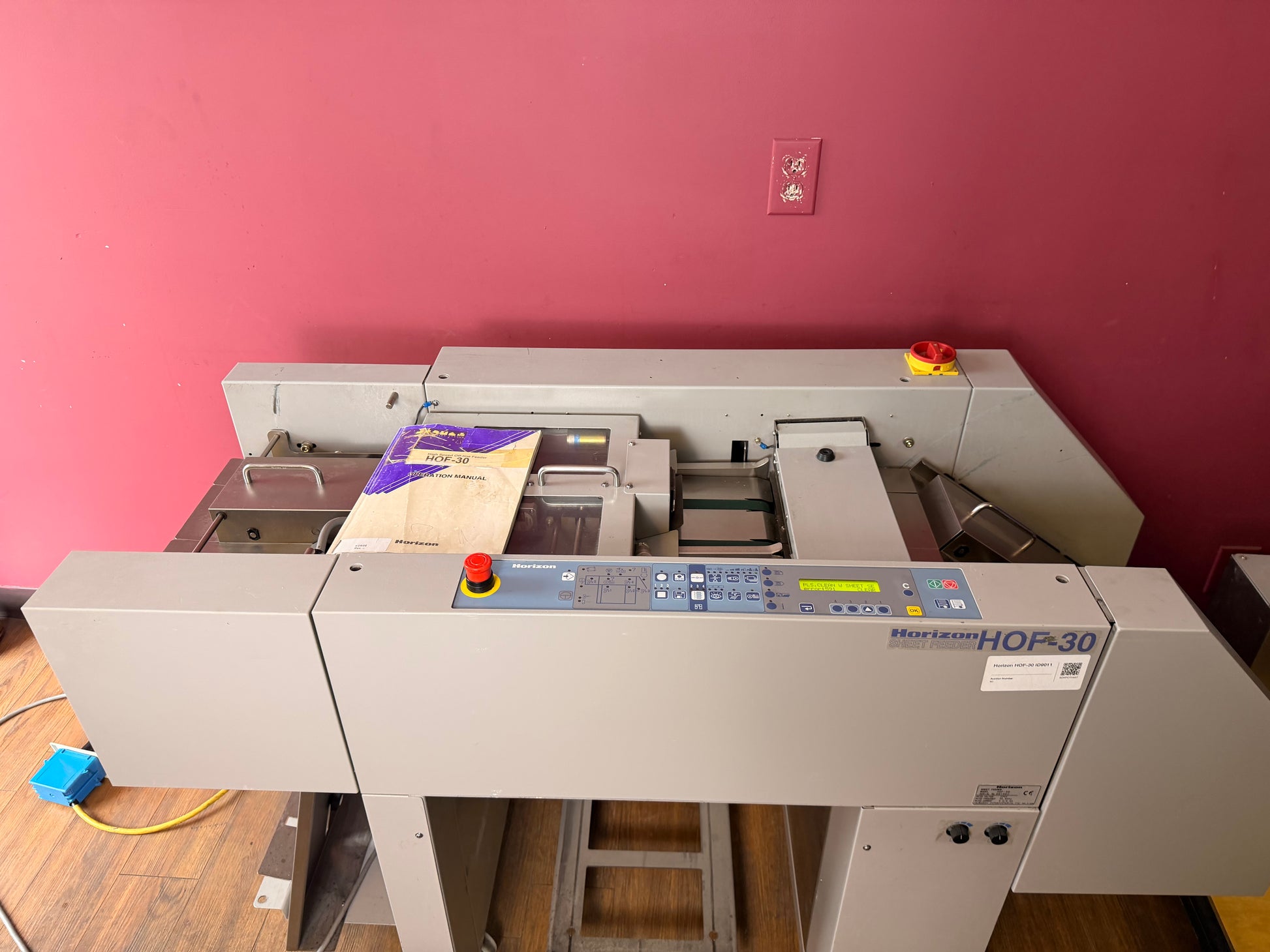 Used Horizon HOF-30 High Speed Off-Line Feeder control panel and feeder mechanism close-up