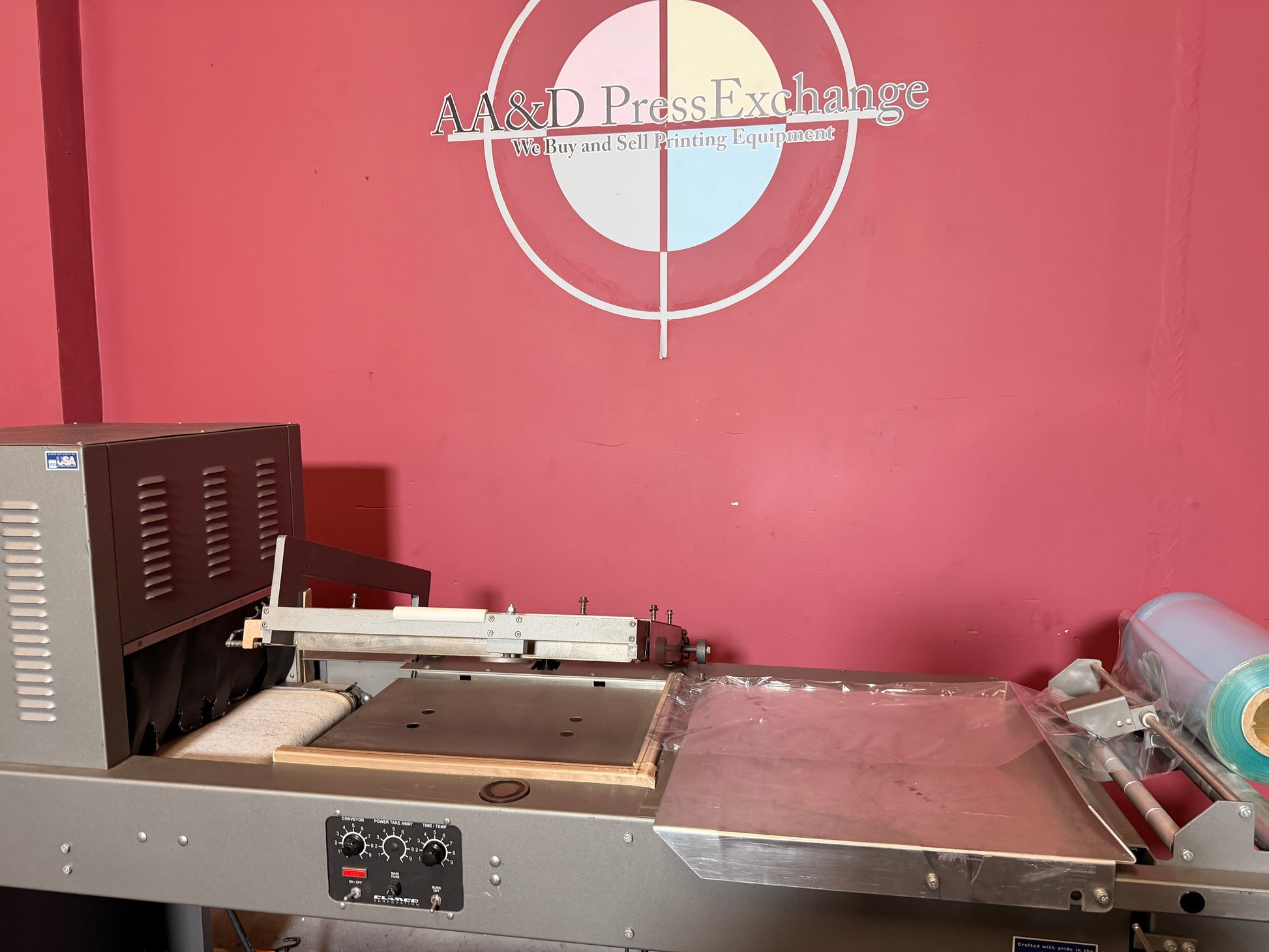 Used industrial Clamco L bar heat tunnel combo automatic shrink wrapping machine