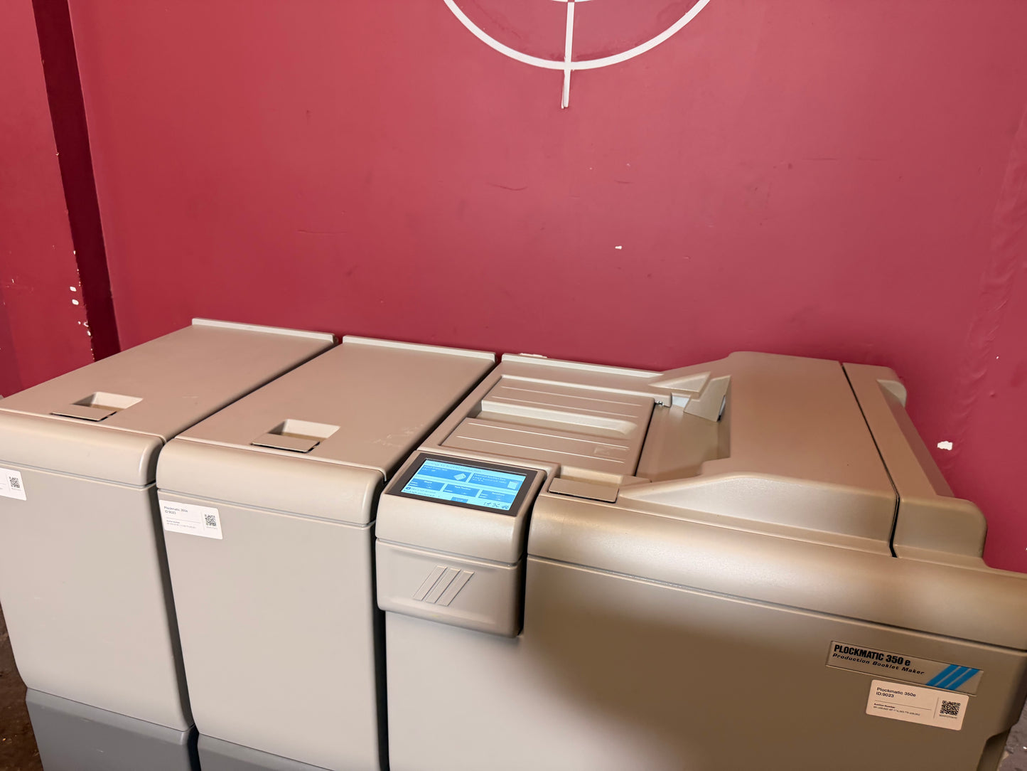 Used Plockmatic 350e booklet maker stitching and folding mechanism detail