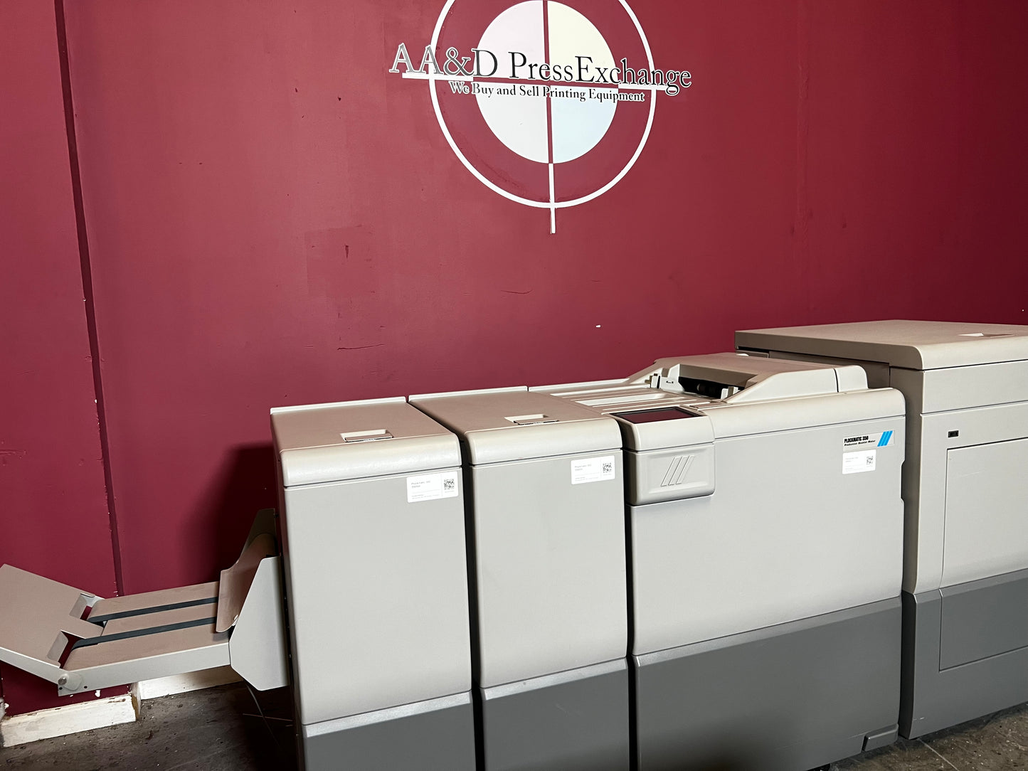 Used Plockmatic 350 70k meter booklet maker top view of booklet output and trim section – AA&D PressExchange