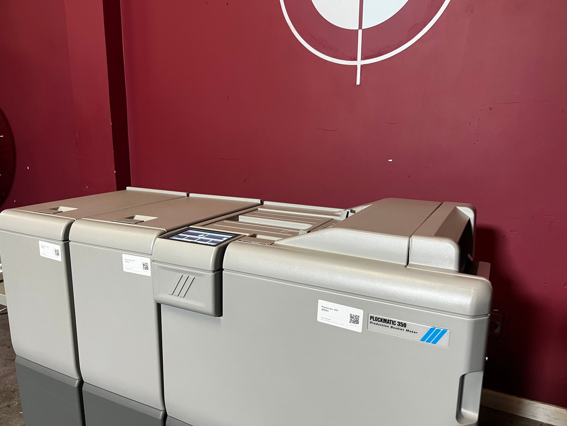 Used Plockmatic 350 64k meter booklet maker rear view showing booklet output section – AA&D PressExchange