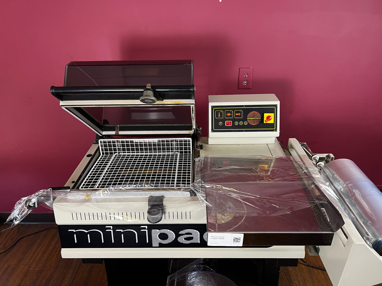 Used Minipack FM-75 Digit chamber-style shrink wrap machine | AA&D PressExchange