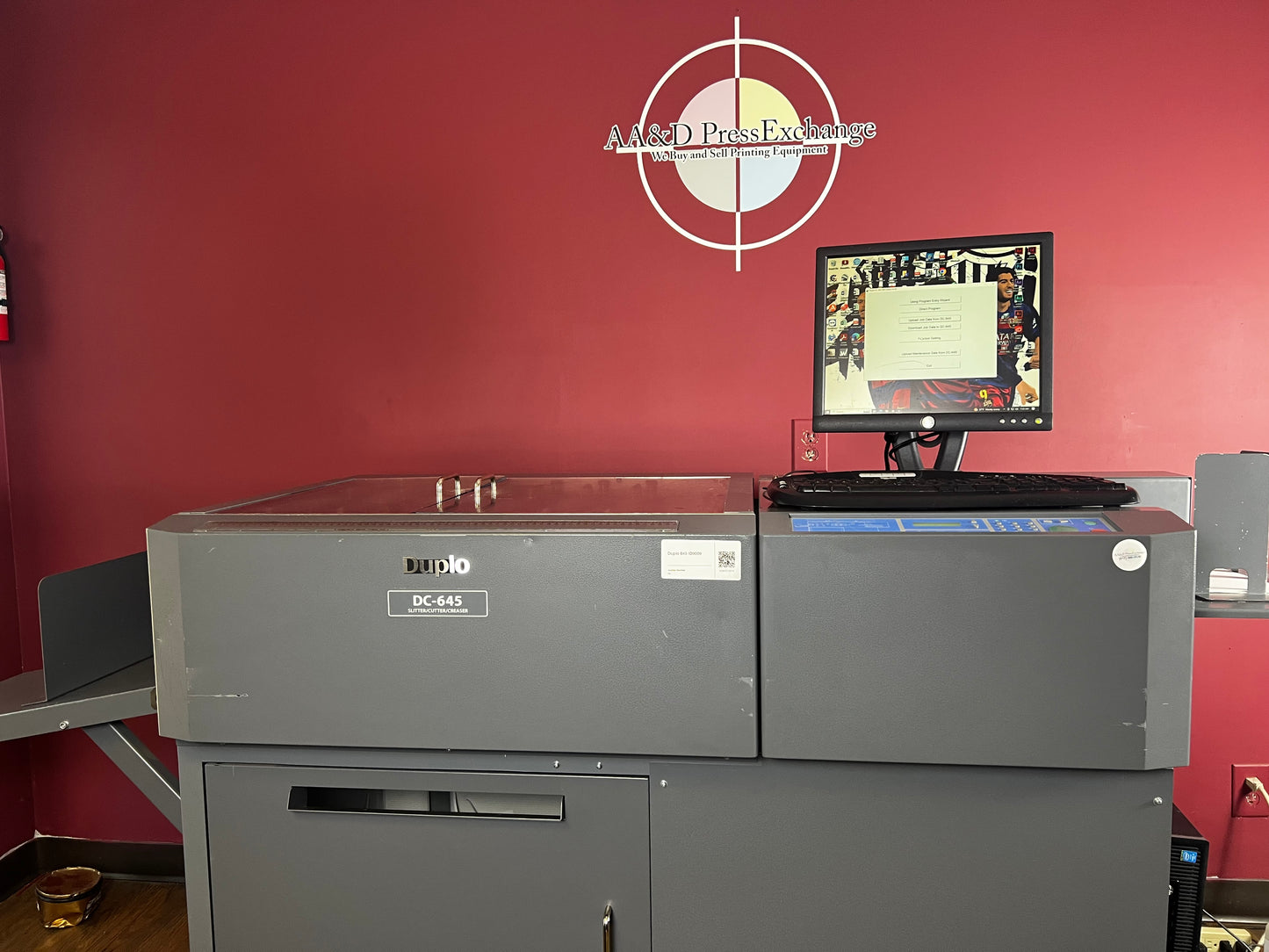 Used Duplo DC-645 Slitter Cutter Creaser operator side view – AA&D PressExchange
