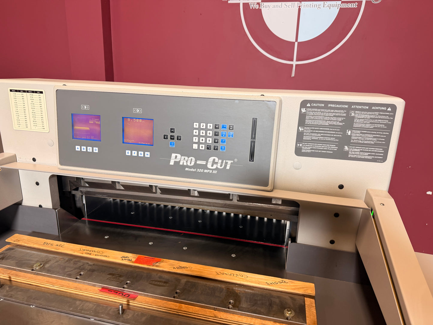 Used Pro-Cut 320 MPS III programmable cutter for sale showing blade safety guard