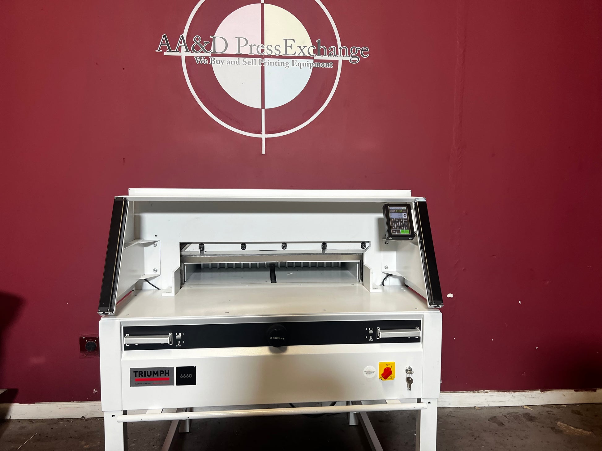Used Triumph 6660 paper cutter with VRCut Ready technology in professional print setup – AA&D PressExchange
