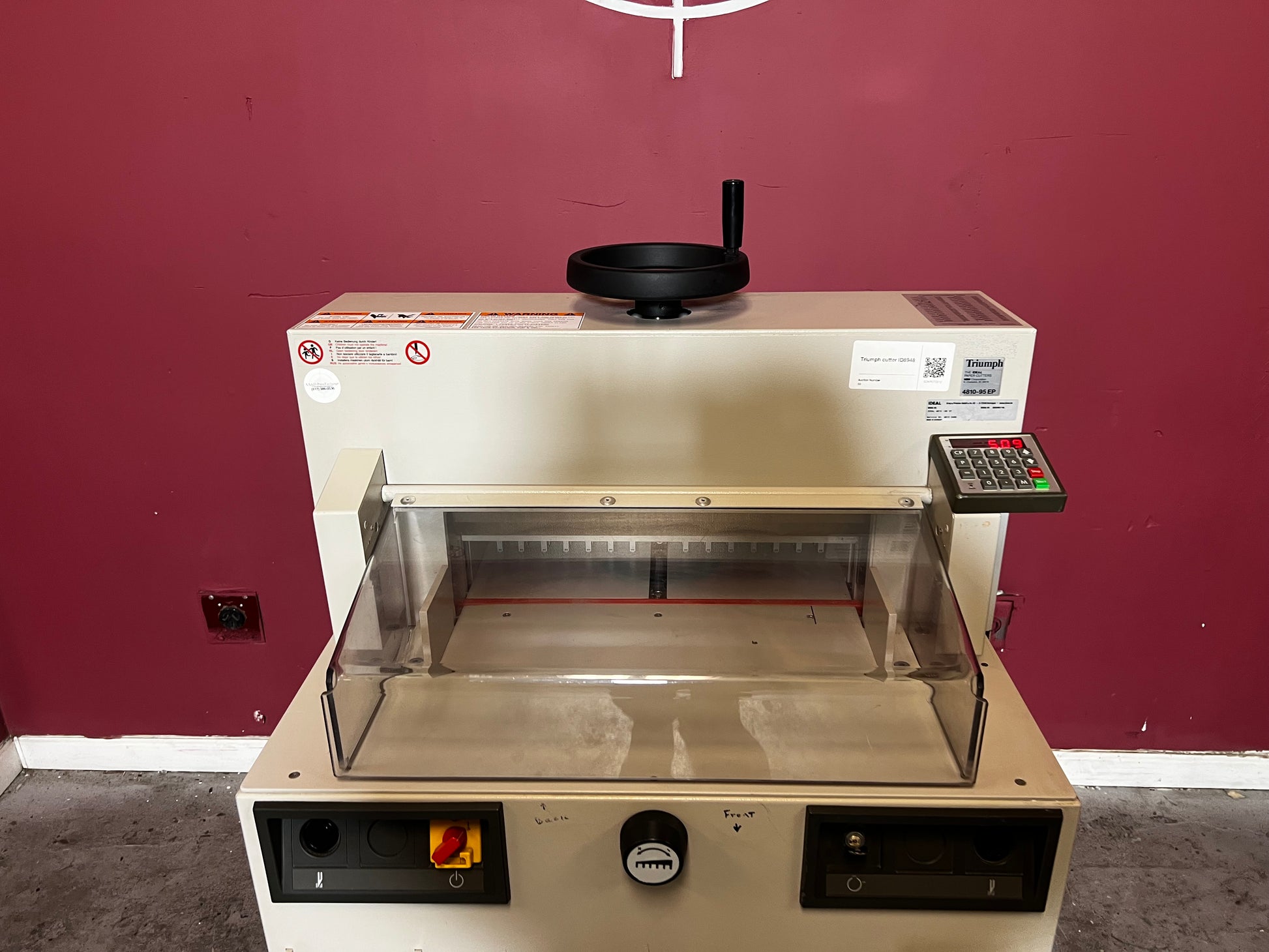 Used Triumph 4810-95EP paper cutter close-up of cutting table and blade – AA&D PressExchange