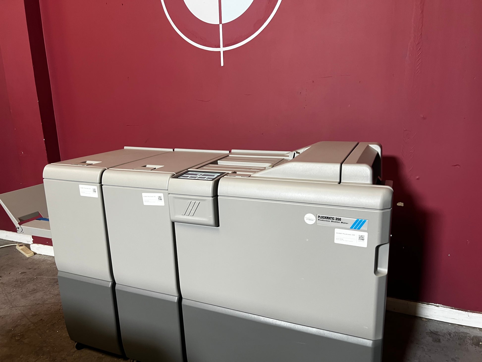 Used Plockmatic 350 bookletmaker LOW METER 167k close-up view of square back and trim mechanism – AA&D PressExchange