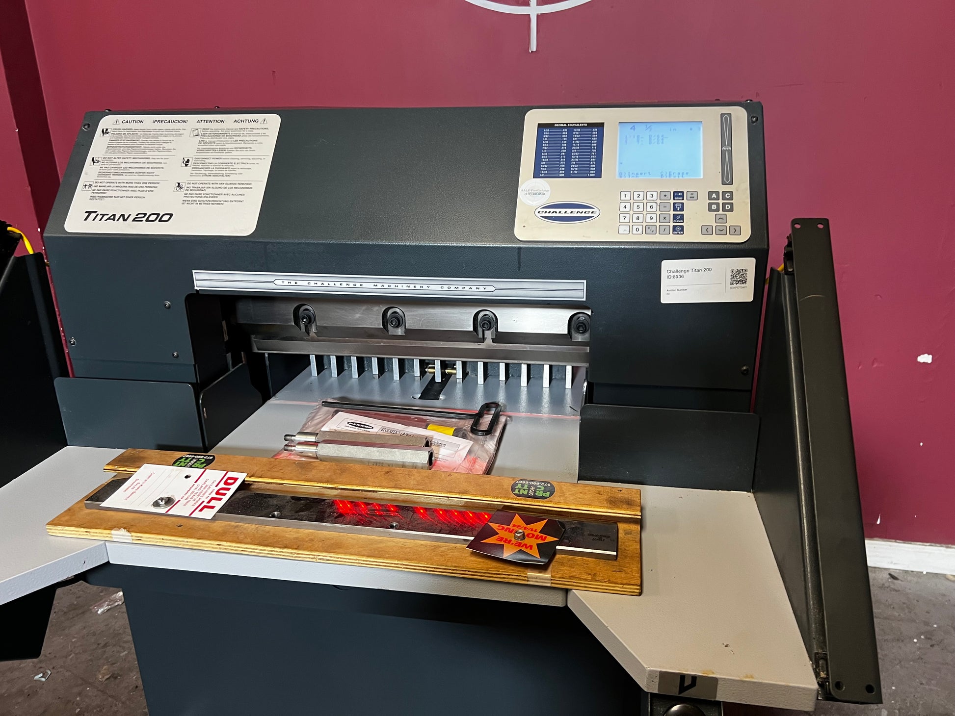 Used Challenge Titan 200C hydraulic paper cutter rear view showing hydraulic components – AA&D PressExchange