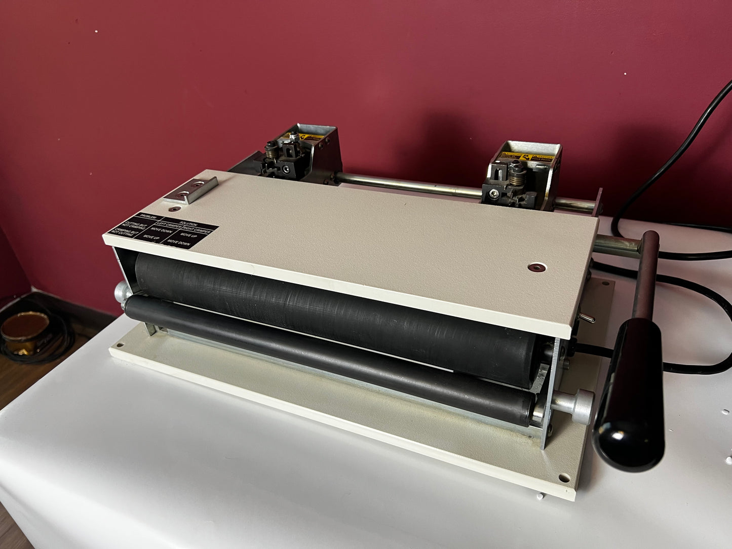 Used GBC CI-12 electric coil inserter and crimper side view | AA&D PressExchange